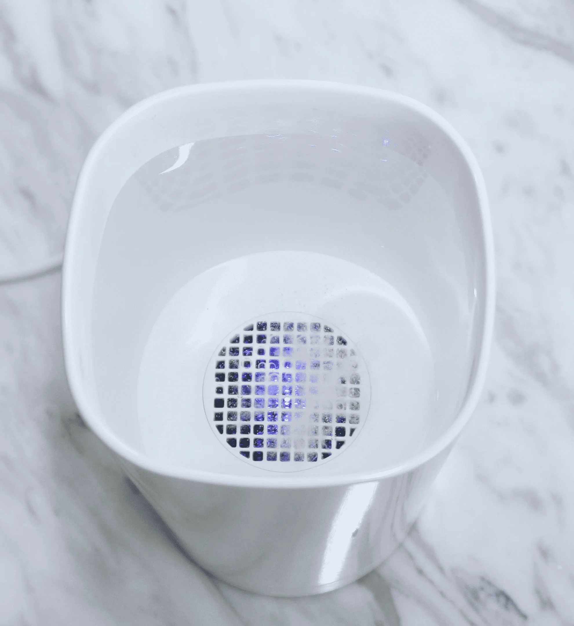 S2Y Smart HOCl Care Cup - Top view showing the electrolysis chamber and user-friendly interface